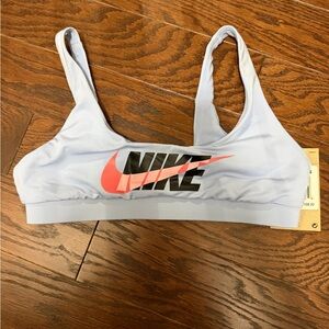 Nike Women's Sky Blue Sports Bra with Pink Swoosh